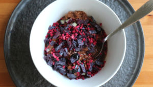 Breakfast oats with berries and purple cabbage